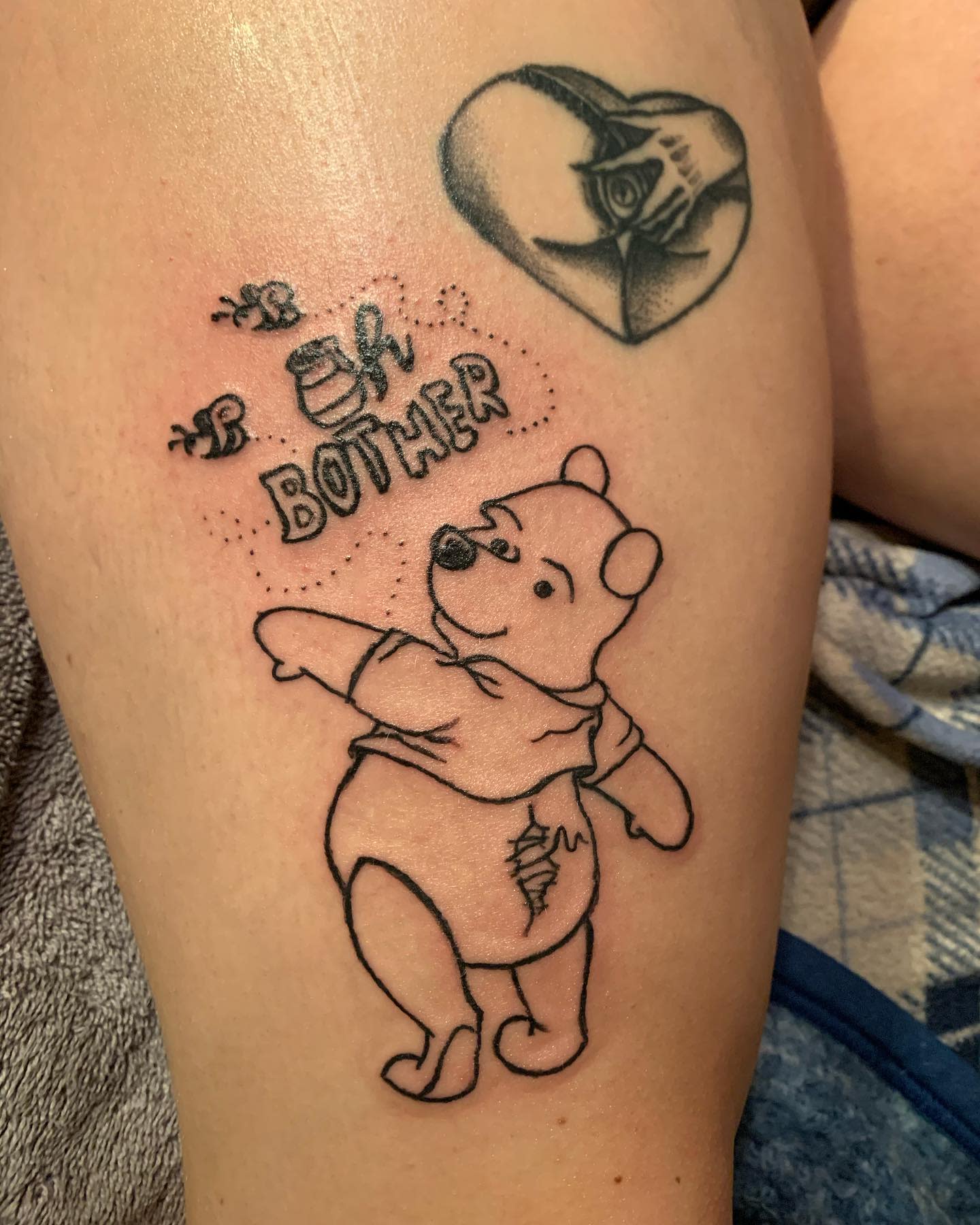 Winnie the Pooh surrounded by bees with the phrase "Oh Bother" and a heart